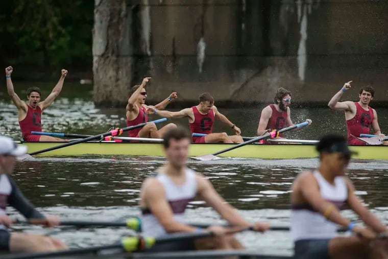 The Colgate men's crew celebrates after winning the men's varsity heavyweight eight final at the 81st annual Dad Vail Regatta on the Schuylkill on May 11, 2019.