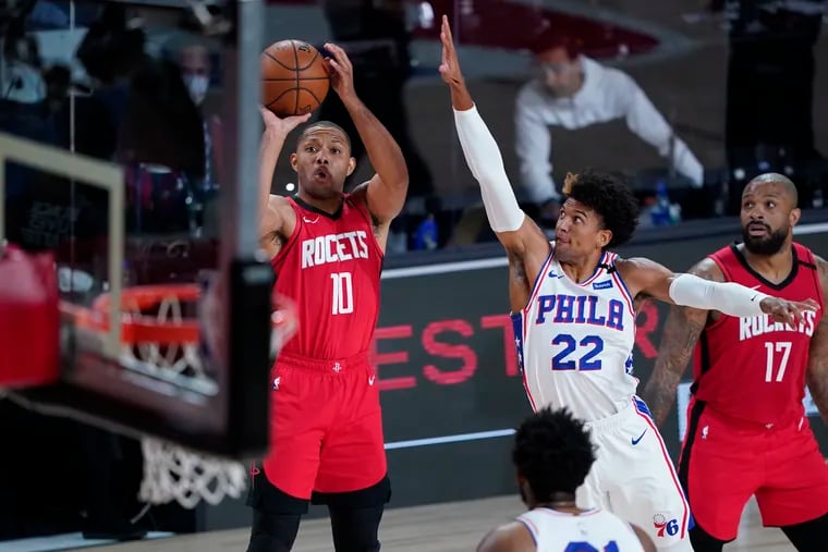 Houston Rockets' Eric Gordon (10) shoots over Sixers rookie Matisse Thybulle (22), who finished with 4 steals and 2 blocks.