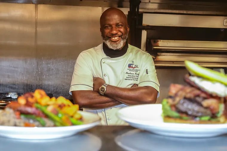 The Imperial Restaurant's Chef Abou with his"Impossible meatloaf, left and Bison Burger, right. Abou is a self-taught chef from West Africa. He moved Lancaster around the time the pandemic hit this year.
