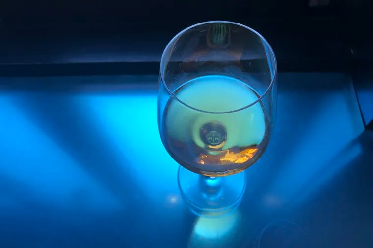 A glass of orange pinot gris at Jet Wine Bar.