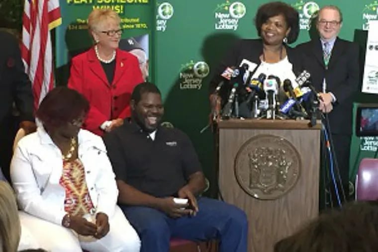 The Smith Family at a news conference last May announcing they were Powerball winners.
