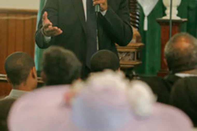 Mayoral candidate Michael Nutter speaks during the service at the La Mott AME Church.