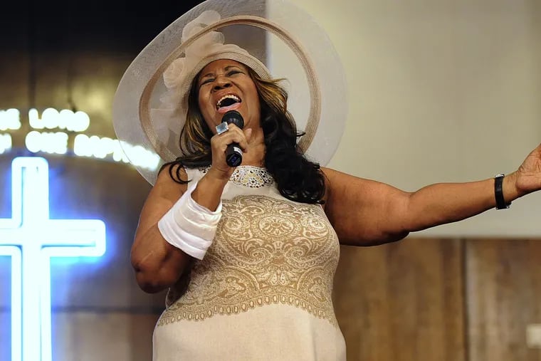 FILE – In this June 7, 2015 file photo, Aretha Franklin sings during a memorial service for her father and brother, Rev. C.L. and Rev. Cecil Franklin, at New Bethel Baptist Church where they were ministers, in Detroit, Mich. Franklin died Thursday, Aug. 16, 2018 at her home in Detroit. She was 76.