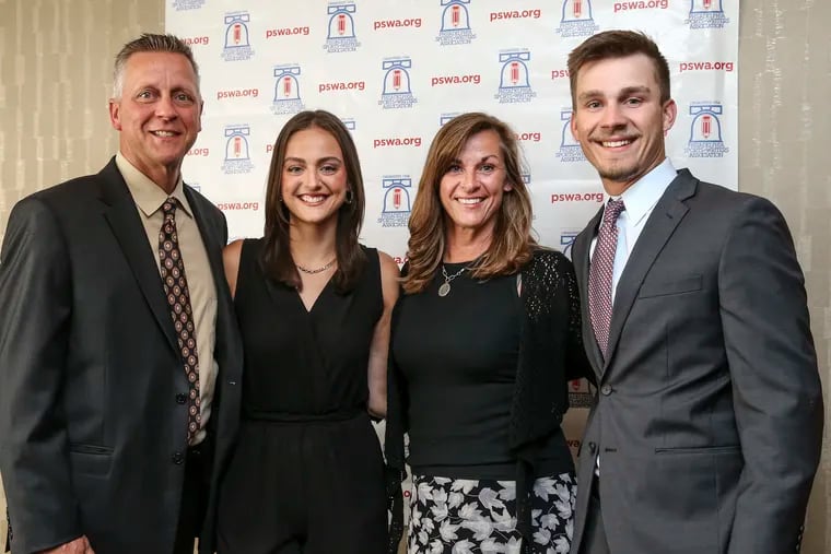 Molly Gorczyca (second from left) with her father Craig (left), mother Kelly (second from right), and brother Tyler (right) at the Philadelphia Sports Writers Association's dinner in Cherry Hill.