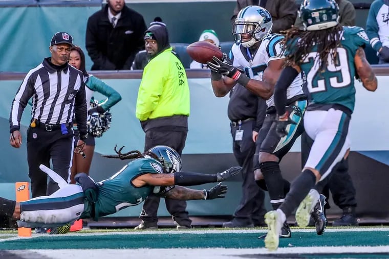 Eagles cornerback Ronald Darby, left, can only dive toward Pathers receiver Devin Funchess, right, as he catches a touchdown pass from Cam Newton to give the Panters their second touchdown in the 4th quarter. The Philadelphia Eagles lost to the Carolina Panthers on October 21, 2018, 21-17. MICHAEL BRYANT / Staff Photographer
