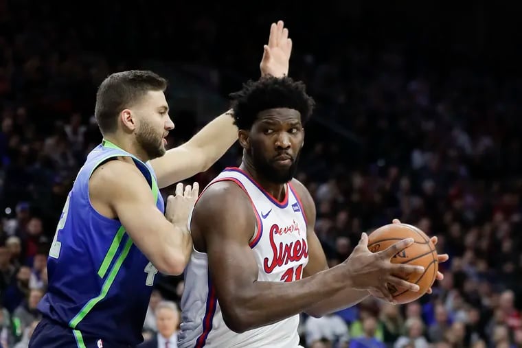 Sixers center Joel Embiid looking to drive against Mavericks forward Maxi Kleber last month.