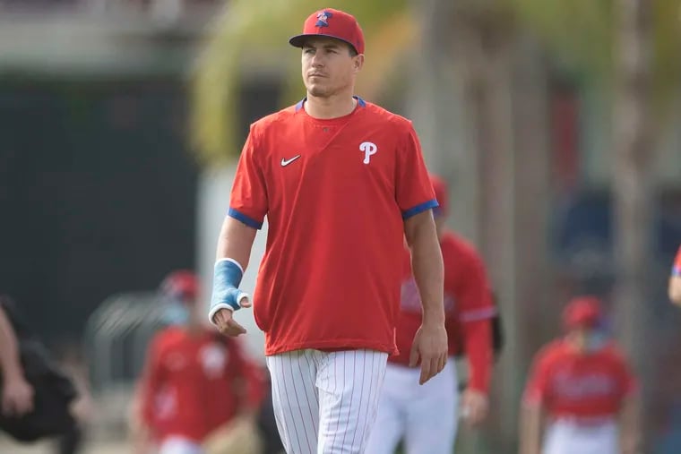 Phillies catcher J.T. Realmuto hasn't played a spring training game yet because of a broken right thumb.