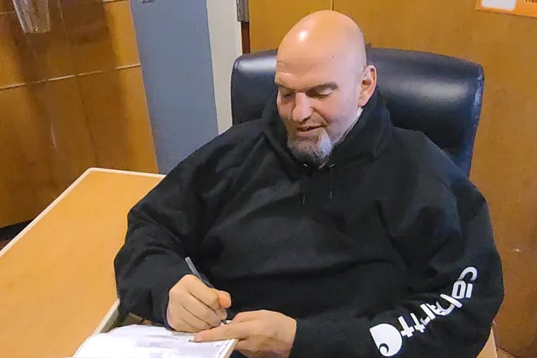 Democratic Senate candidate John Fetterman votes by emergency absentee ballot on May 17, 2022, after suffering a stroke.
