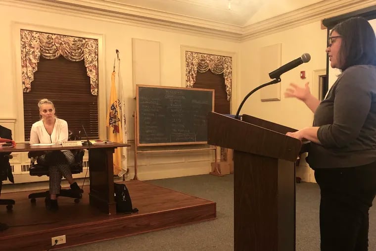 Katie Ingersoll, representing South Jersey Women for Progressive Change, commends Haddonfield's mayor and commission Tuesday for approving an agreement to boost the number of affordable housing units in the borough.