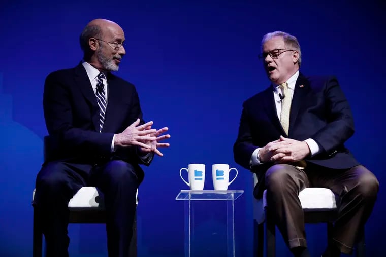 Democratic Gov. Tom Wolf, left, and Republican Scott Wagner take part in a gubernatorial debate in Hershey , Pa., Monday, Oct. 1, 2018. The debate is hosted by the Pennsylvania Chamber of Business and Industry.