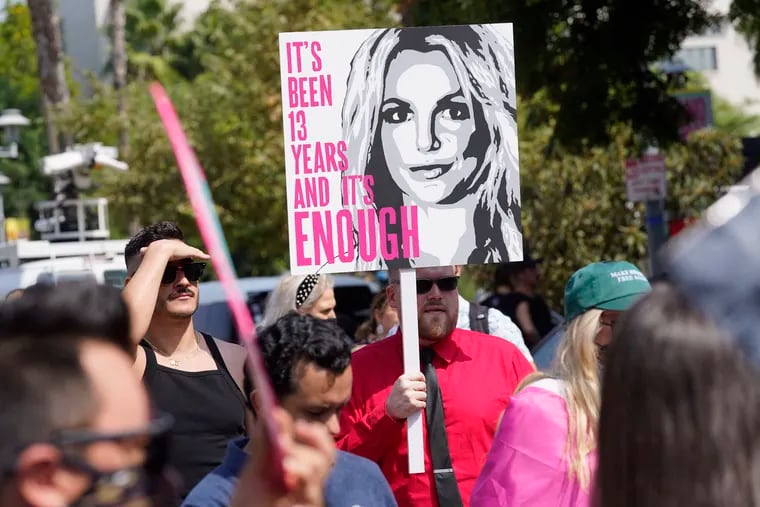 Britney Spears supporters demonstrate outside the Stanley Mosk Courthouse on Wednesday in Los Angeles. A Los Angeles judge removed Spears' father from the conservatorship that controls her life and money.