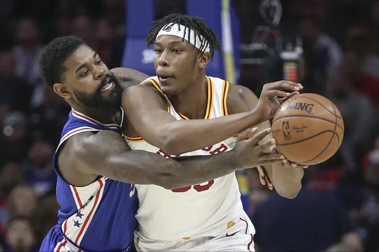 Amir Johnson defends against Myles Turner during the first quarter of the Sixers’ 101-98 loss to the Pacers Tuesday night at the Wells Fargo Center.