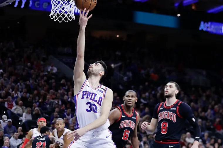 Sixers guard Furkan Korkmaz lays up the basketball during the first quarter against the Bulls.