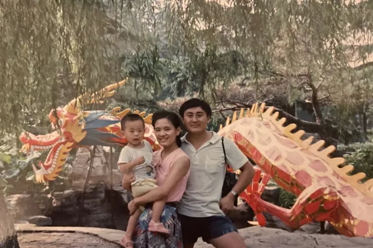 Leo Wang with his parents in the summer of 1991 at Daming Lake in Jinan, China.