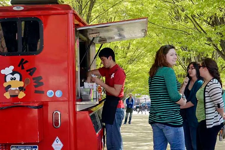 Food trucks will keep driving, and Philadelphia may institute industry-friendly rules. (TOM GRALISH / Staff Photographer)