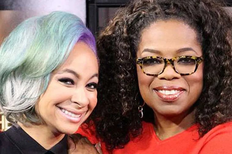 Oprah Winfrey with Raven-Symon&#0233; at a Sunday interview for &quot;Oprah: Where Are They Now?&quot; The actress' declaration that she is &quot;American, not African American&quot; has sparked a social-media backlash; Drexel professor Yaba Blay says Symon&#0233; has &quot;rejected the identity that opened up many doors for her.&quot; (Harpo,Inc/George Burns)