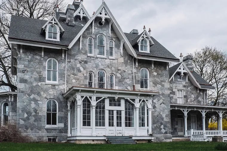 Dating to 1868, Loch Aerie is a 6,522-square-foot marvel of peaked roofs, arched windows.