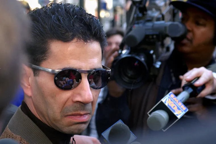 In this Feb. 20, 1997 file photo, Joseph "Skinny Joey" Merlino talks to the media outside the Criminal Justice Center
