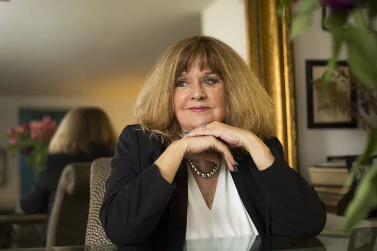 Carole Mallory, shown in her Norristown apartment, is suing an author and publisher for misrepresenting her love affair with Norman Mailer.