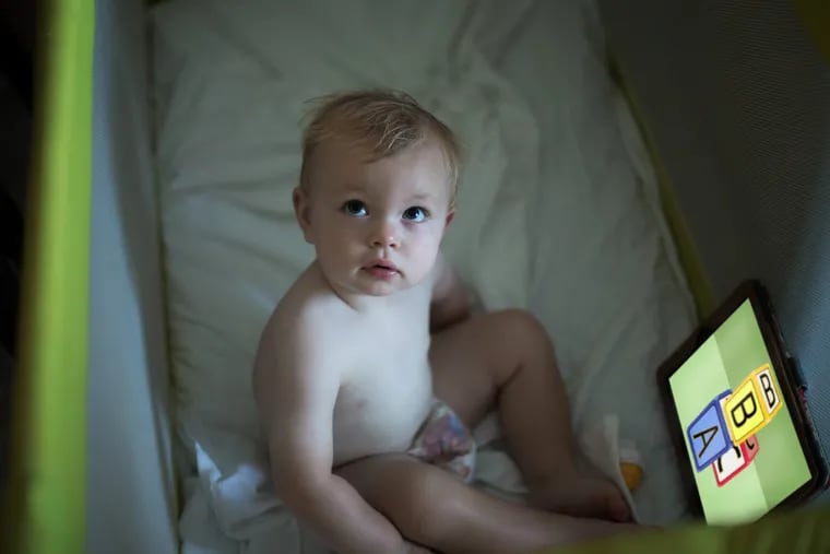 Tablets and smart phones may quiet youngsters, but used in bed, they are sleep disrupters.