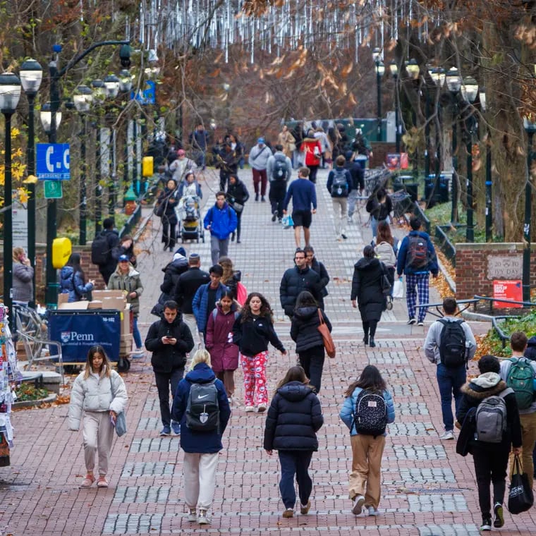 University of Pennsylvania students walking along Locust Walk in December.