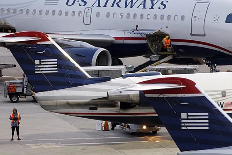 Turbulence injured six on US Airways flight from Philadelphia to Florida on Sunday (ELISE AMENDOLA / Associated Press / File)