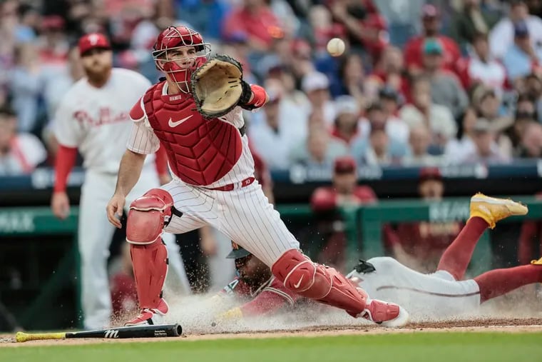 Phillies catcher J.T. Realmuto has no play on  Diamondbacks Geraldo Perdomo scoring on a Ketel Marte triple during the 3rd inning at Citizens Bank Park in Philadelphia, Tuesday, May 23, 2023 