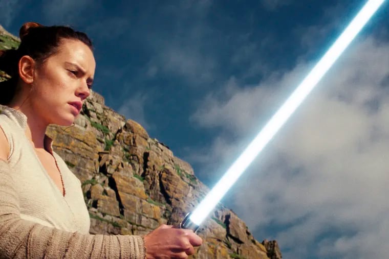 This image released by Lucasfilm shows Daisy Ridley as Rey in "Star Wars: The Last Jedi." The Skywalker saga may be coming to an end this December as the latest Star Wars trilogy finishes, but 8 months out from its release fans still know precious little about what director J.J. Abrams and Lucasfilm president Kathleen Kennedy have in store for “Episode IX," which opens nationwide on Dec. 20.
