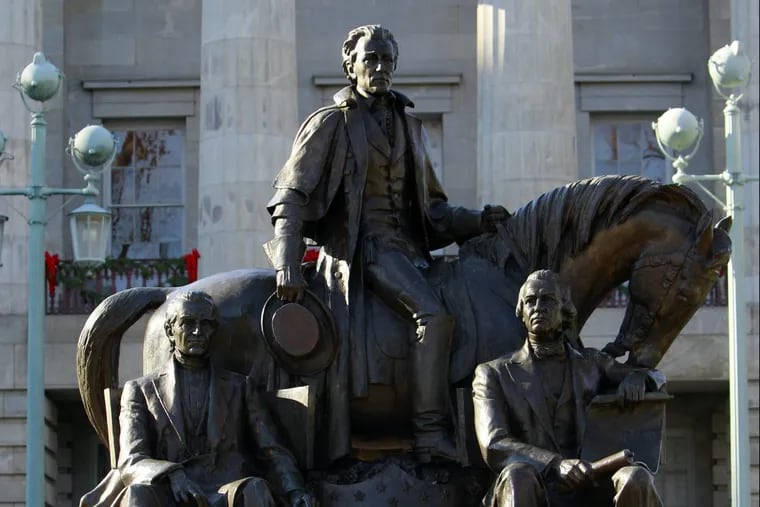 The statue of Andrew Jackson and two other presidents — (seated from left) James Polk and Andrew Johnson — in front of North Carolina’s state Capitol.