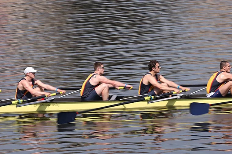 Members of Drexel University's Men's Varsity Heavyweight Eight crosses the finish line during heat at the Aberdeen Dad Vail Regatta in Philadelphia, Pa. on May 8, 2015. (David Maialetti/Staff Photographer)