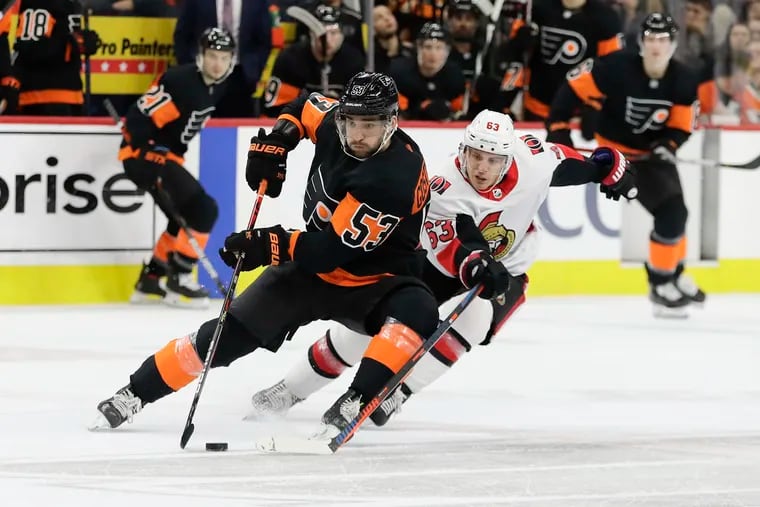 Flyers defenseman Shayne Gostisbehere skating past Ottawa's Tyler Ennis earlier this season.