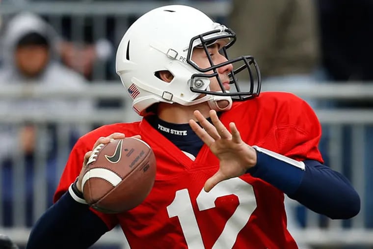Penn State quarterback Steven Bench (12) looks to pass in the first half of their spring NCAA college football game on Saturday, April 20, 2013, in State College, Pa. (Keith Srakocic/AP)