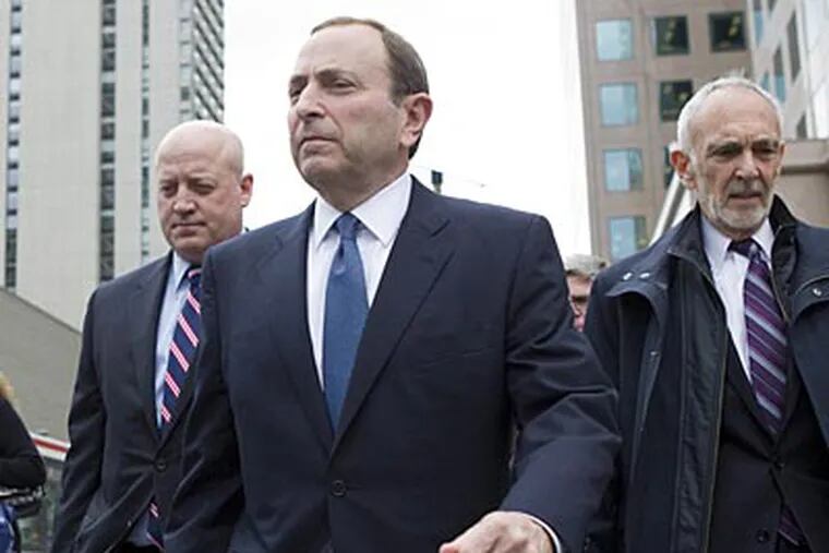 NHL commissioner Gary Bettman leaves NHLPA offices on Thursday, October 18. (Chris Young/AP/The Canadian Press)