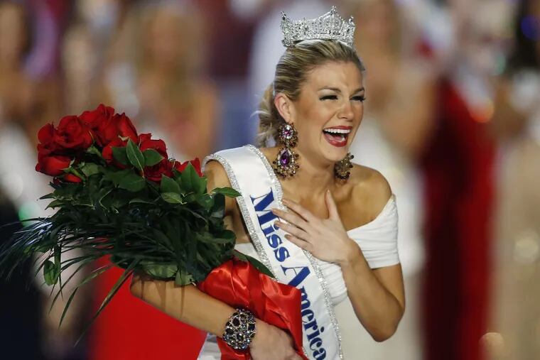 In this Jan. 12, 2013 file photo, Miss New York Mallory Hytes Hagan reacts as she is crowned Miss America 2013 in Las Vegas. Trashed by emails sent by pageant officials, Hagan and other former Miss Americas helped choose Gretchen Carlson as the new chair of the Miss America Organization.