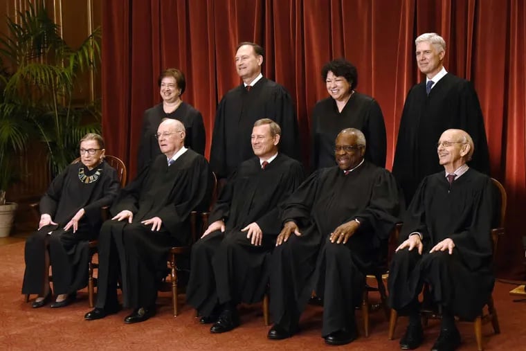 Members of the U.S. Supreme Court pose for a group photograph on June 1. Seated, from left,  Ruth Bader Ginsburg, Anthony M. Kennedy, John G. Roberts, Clarence Thomas, and Stephen Breyer, and (standing, from left, Elena Kagan, Samuel Alito Jr., Sonia Sotomayor, and Neil Gorsuch.
