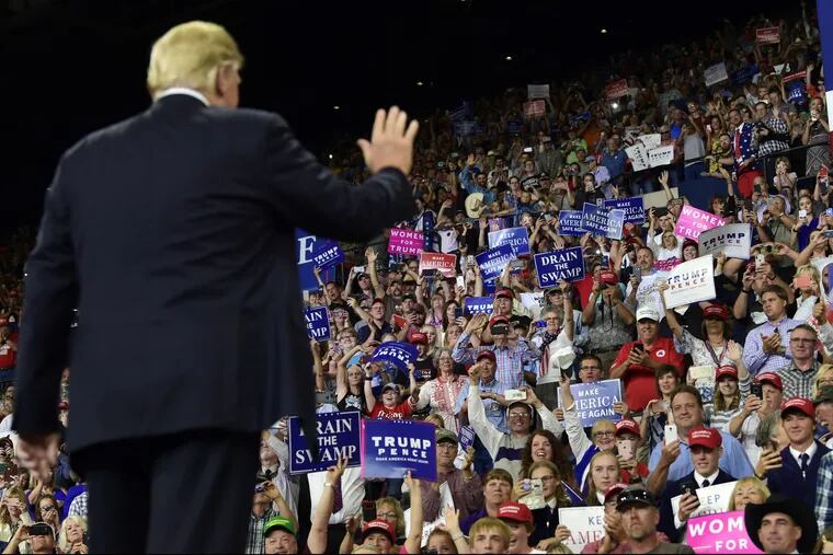 President Trump, pictured at a rally in Montana this month, looms over the midterm elections. Even as he energizes the left, the president has been conspicuously absent from Democratic campaign ads in the general election.