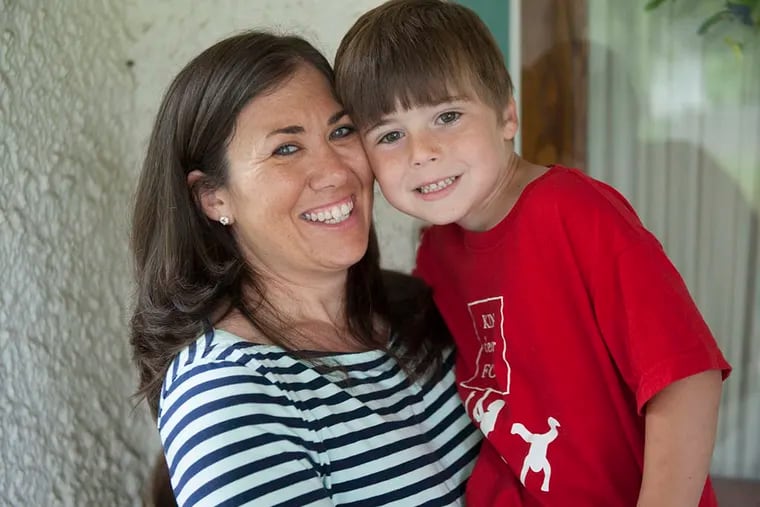 Trisha Sheehan and son Liam, 5, at home in Wenonah. He started having health problems after the 2012 train derailment released a carcinogen into the air. At that time, they lived in Woodbury. (MICHAEL PRONZATO/Staff Photographer)