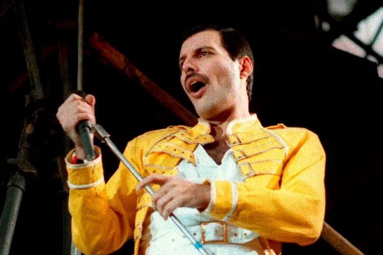 FILE - In this July 20, 1986 file photo, Queen lead singer Freddie Mercury performs, in Germany.  A previously unheard and unreleased song by Mercury was released Thursday, June 20, 2019.  Universal Music announced that the track, “Time Waits for No One,” was originally recorded in 1986 for the concept album of the musical “Time” with musician Dave Clark. A video to accompany the song was also released and includes unseen performance footage of Mercury. It was recorded in April 1986 at London’s Dominion Theatre.  (AP Photo/Marco Arndt, File)