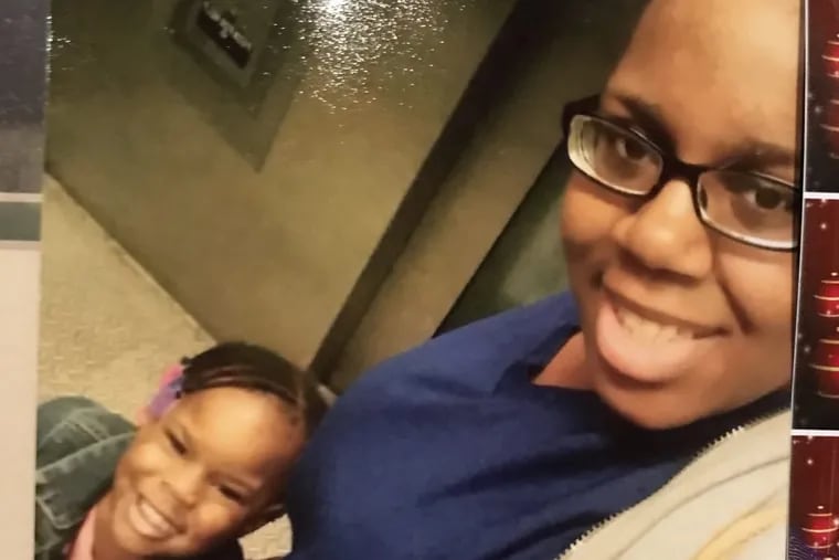 Tyisha Timmons, right, with a niece. Timmons, 23, was shot dead while driving a van full of family members – including her twin sister and three young children – on Broad Street on Feb. 21, 2018.