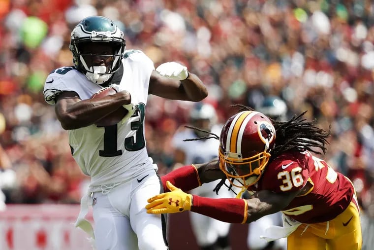 Nelson Agholor breaks free from  Redskins free safety D.J. Swearinger for a 58-yard touchdown in the opener.
