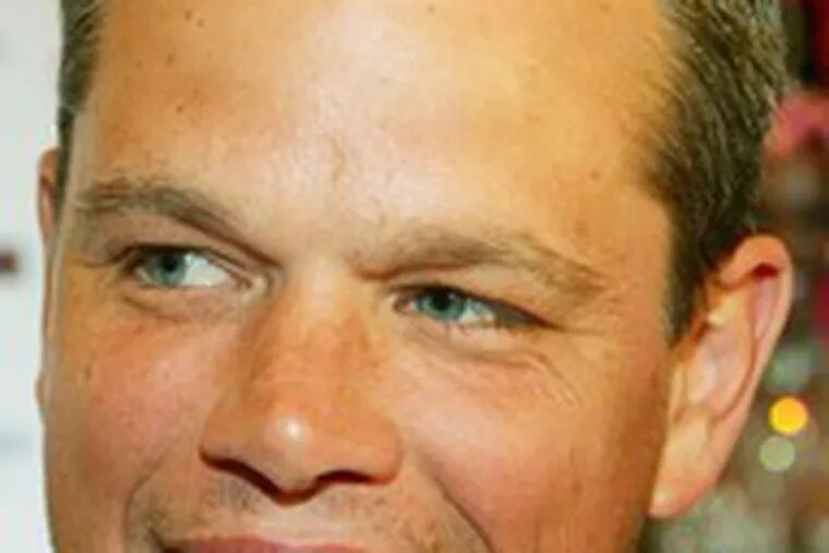 Matt Damon, pre-poker face. He and his pal bet for charity.