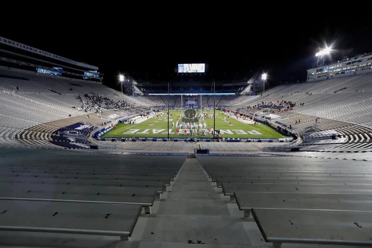 Ohio State players warmed up before a game against Penn State in a nearly empty Beaver Stadium last October.