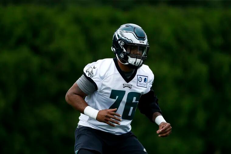 Eagles' fourth-round draft pick Shareef Miller runs drills at rookie minicamp on Friday.