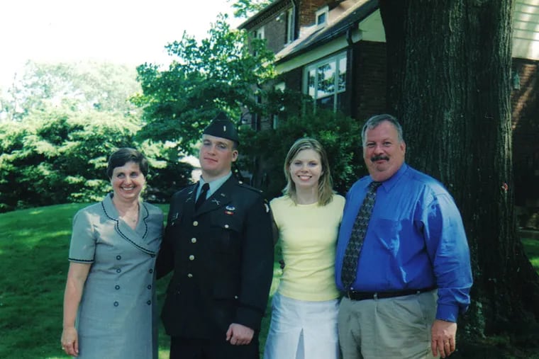 The Gurbisz family after Jim Gurbisz's graduation from West Point in 2002 (from left): Mother Helen, son Jim, daughter Kathy, and father Ken. Jim Gurbisz died in Iraq in 2005.