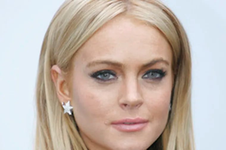 Lindsay Lohan allegedly wrecked her Benz convertible May 26 and fled.