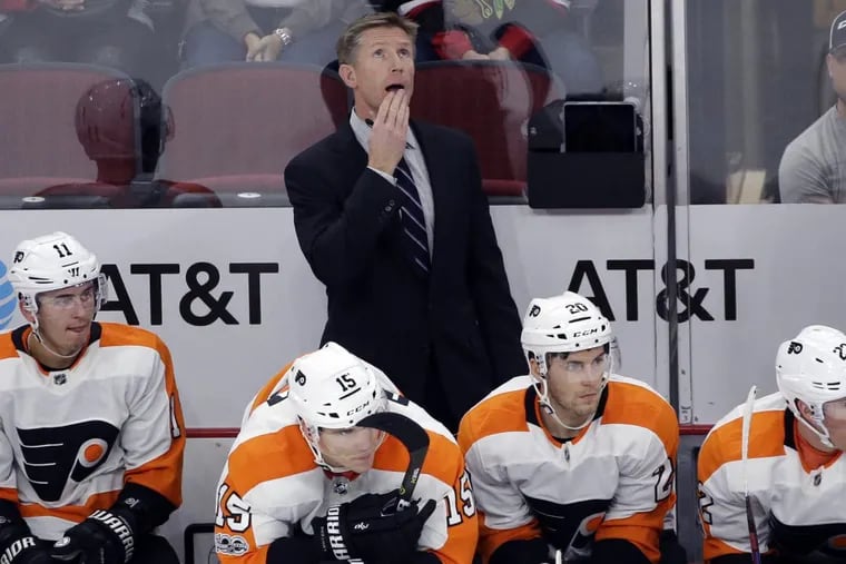 Dave Hakstol and the Flyers are in Boston on Saturday looking or first win since Nov. 9. (AP Photo/Nam Y. Huh)