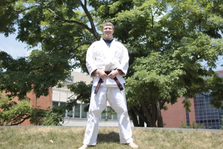 Will Dampier, a judo instructor as well as a Ph.D. student at Drexel, is following up the HIV competition he organized. (David Swanson / Staff Photographer)