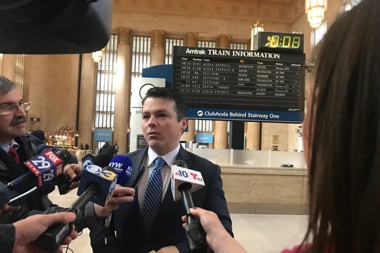 U.S. Rep. Brendan Boyle speaks after meeting with Amtrak regarding the split-flap sign at 30th Street Station.