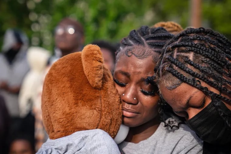 Cyerra Dorman (center) at a balloon release and vigil for Jaseem Thomas in 2023. The 16-year-old was one of 23 young people lost to gun violence last year in Philadelphia.