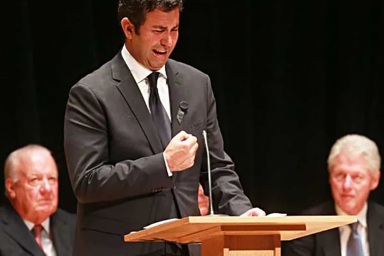 Lewis Katz's son Drew A. Katz becomes emotional speaking last at the memorial service at Temple University Wednesday June 4, 2014. ( DAVID SWANSON / Staff Photographer )